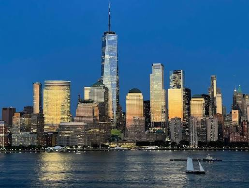New York City skyline at dusk seen across the Hudson River